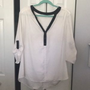 White blouse with black trim